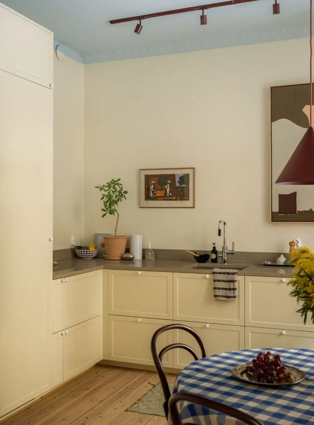 Painted Ceilings and a Light Yellow Kitchen in a Swedish Apartment 13 renovated-late-19th-century-apartment-yellow-kitchen-nordroom