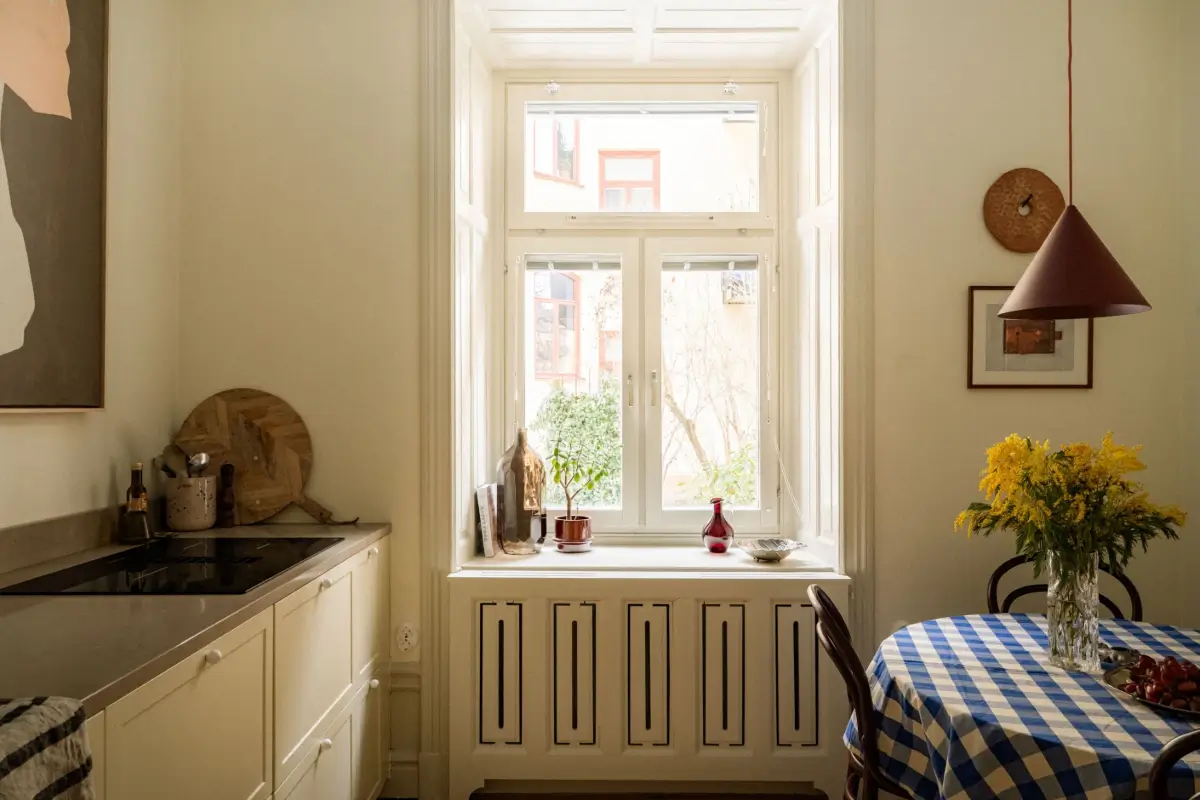 Painted Ceilings and a Light Yellow Kitchen in a Swedish Apartment 14 renovated-late-19th-century-apartment-yellow-kitchen-nordroom