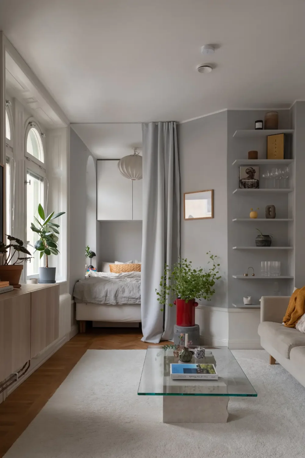 Studio Apartment Layout Ideas: Living Small is Looking Good 22 studio-apartment-layout-ideas-bed-behind-curtain-nordroom