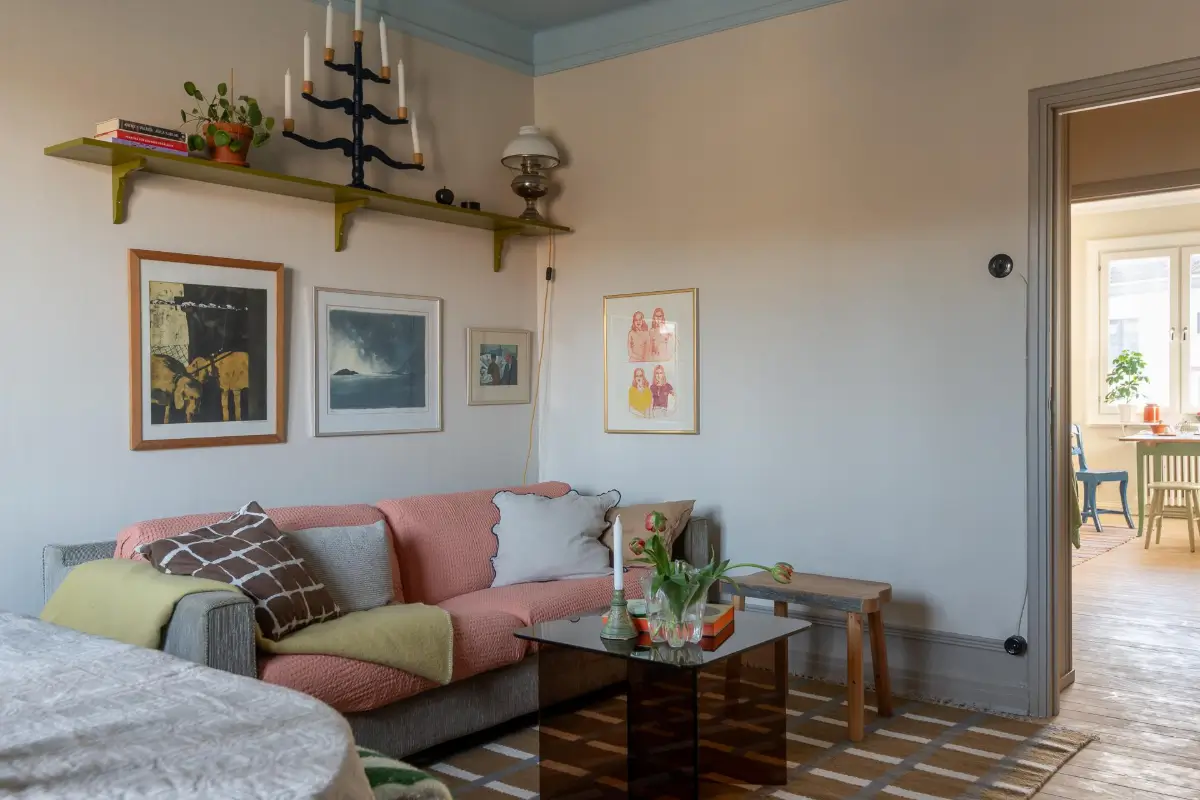 Preserved Details and a Warm Yellow Kitchen in a 1920s Apartment 19 yellow-kitchen-light-blue-living-room-ceiling-swedish-apartment