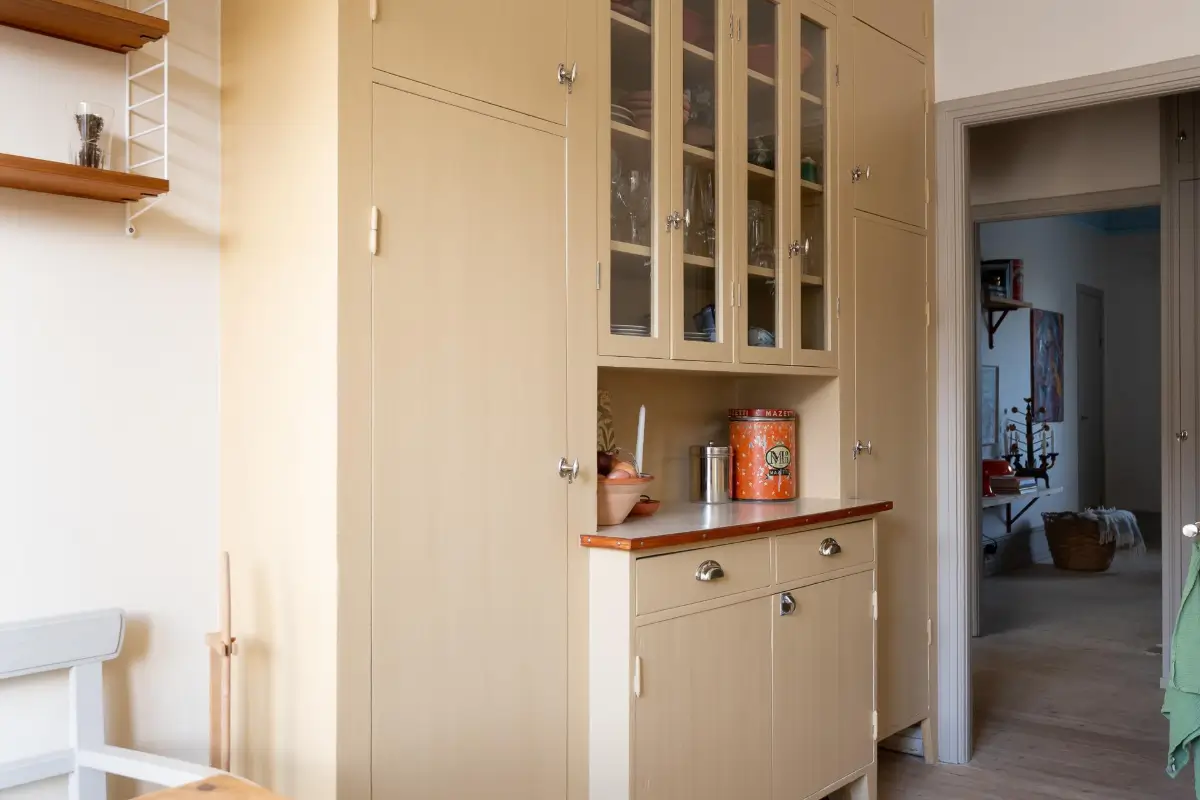 Preserved Details and a Warm Yellow Kitchen in a 1920s Apartment 10 yellow-kitchen-light-blue-living-room-ceiling-swedish-apartment