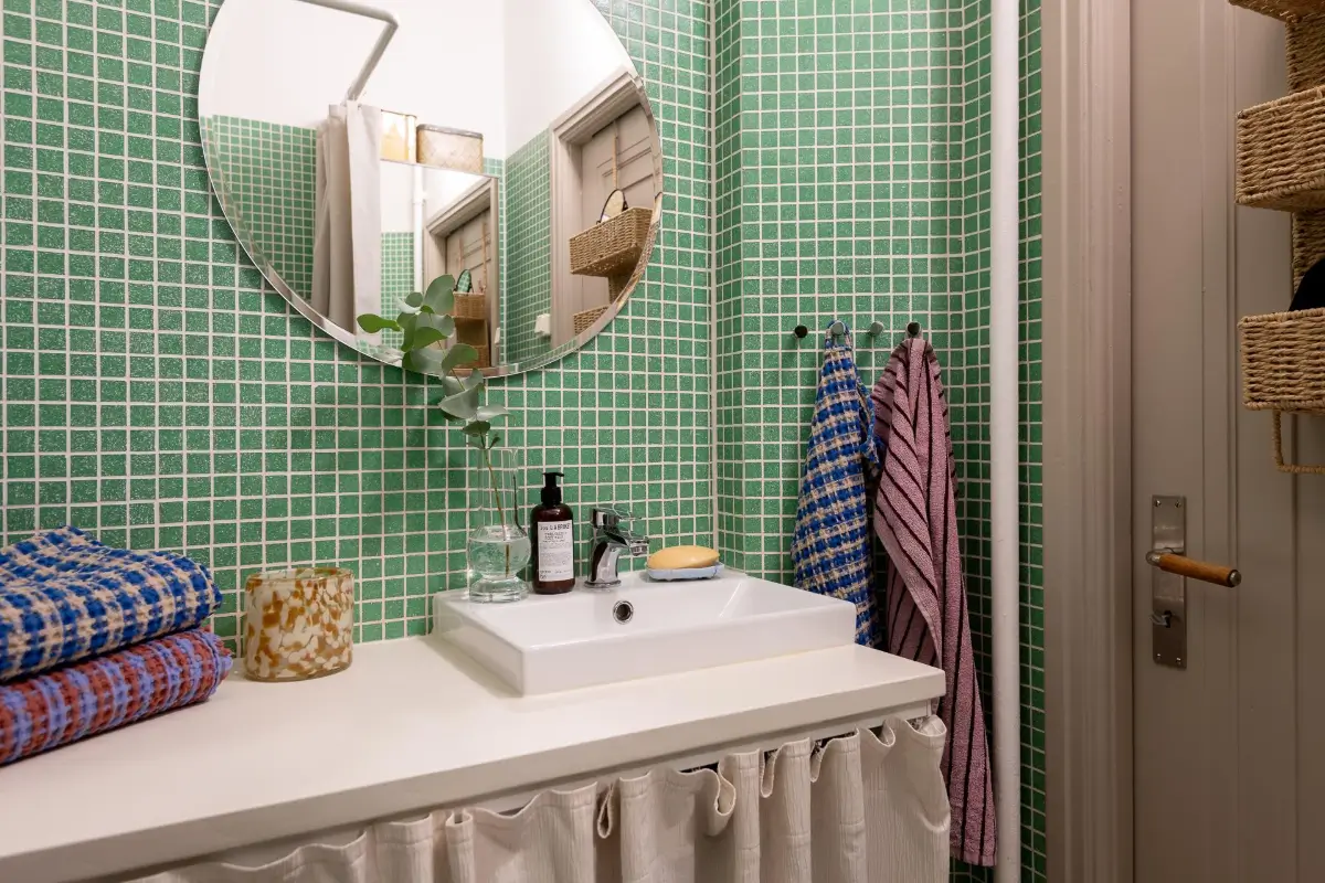Preserved Details and a Warm Yellow Kitchen in a 1920s Apartment 26 yellow-kitchen-light-blue-living-room-ceiling-swedish-apartment