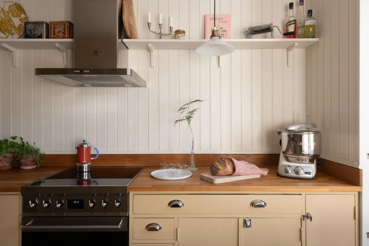 Preserved Details and a Warm Yellow Kitchen in a 1920s Apartment 6 yellow-kitchen-light-blue-living-room-ceiling-swedish-apartment