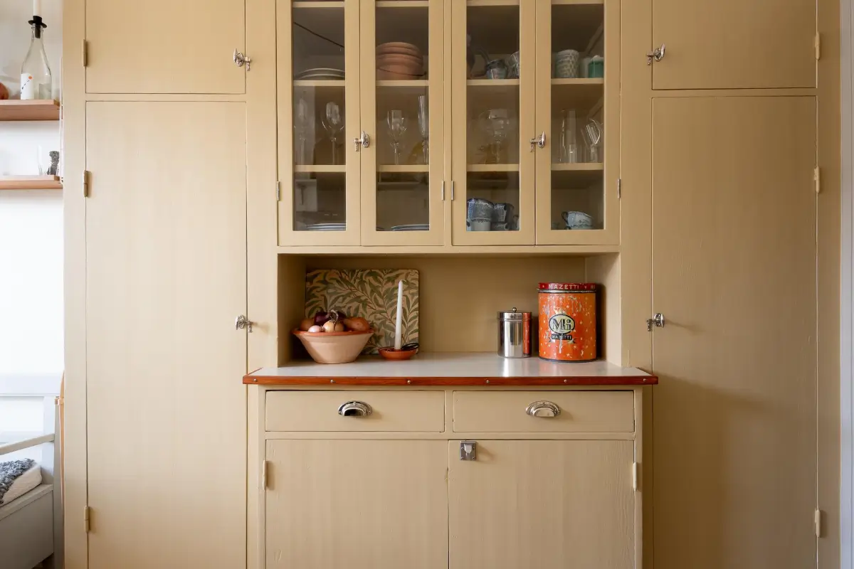 Preserved Details and a Warm Yellow Kitchen in a 1920s Apartment 11 yellow-kitchen-light-blue-living-room-ceiling-swedish-apartment
