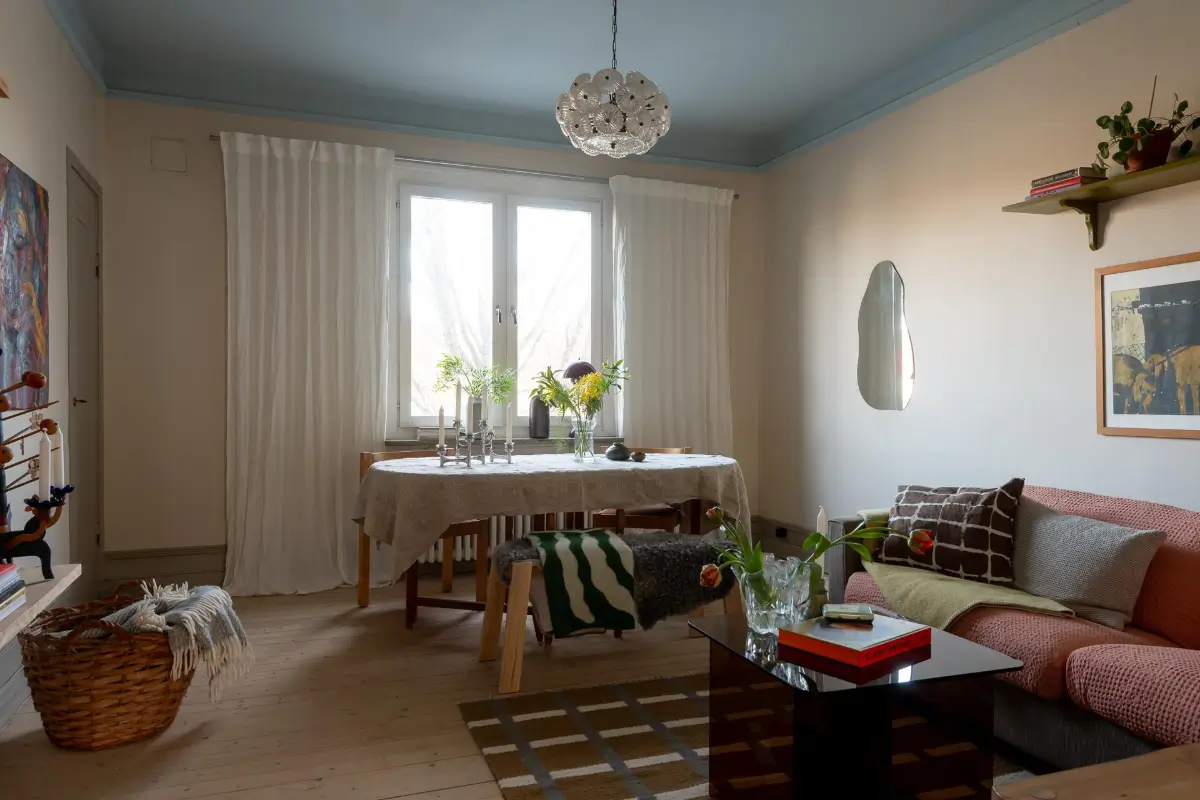 Preserved Details and a Warm Yellow Kitchen in a 1920s Apartment 12 yellow-kitchen-light-blue-living-room-ceiling-swedish-apartment
