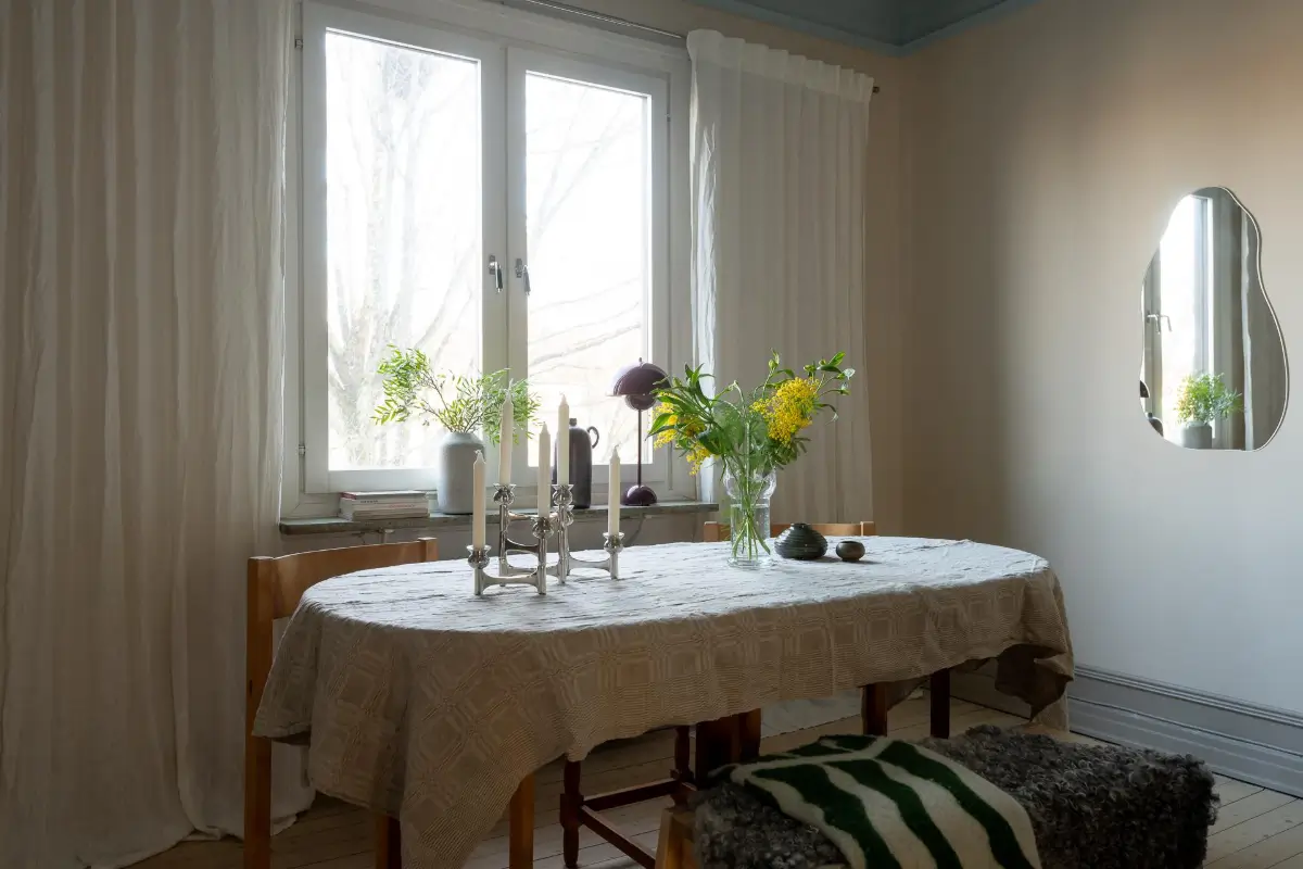 Preserved Details and a Warm Yellow Kitchen in a 1920s Apartment 18 yellow-kitchen-light-blue-living-room-ceiling-swedish-apartment