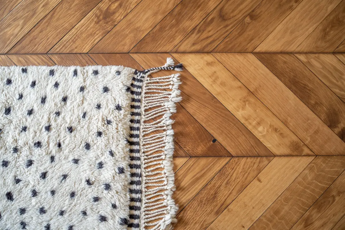 Cheerful Colors in a Small & Light 1940s Apartment in Stockholm 13 chevron wooden floor