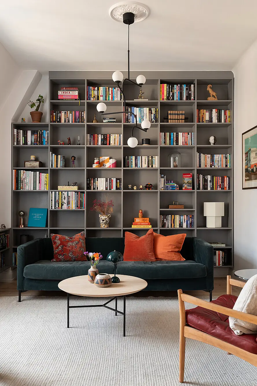 A Light Top-Floor Apartment with a Built-in Bookcase 2 floor-to-ceiling-bookcase-early-20th-century-apartment