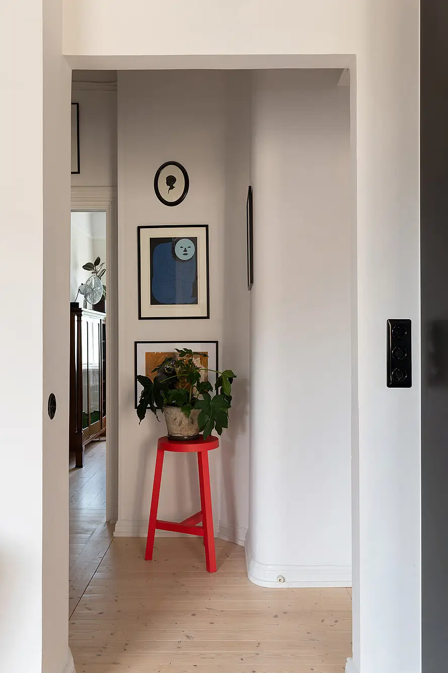 A Light Top-Floor Apartment with a Built-in Bookcase 14 floor-to-ceiling-bookcase-early-20th-century-apartment