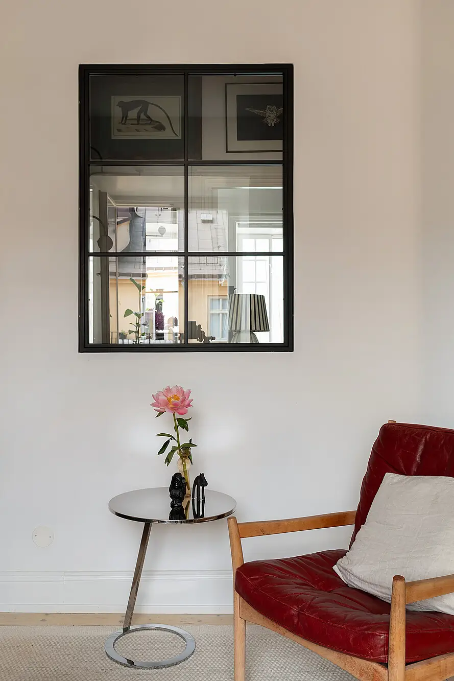 A Light Top-Floor Apartment with a Built-in Bookcase 5 floor-to-ceiling-bookcase-early-20th-century-apartment