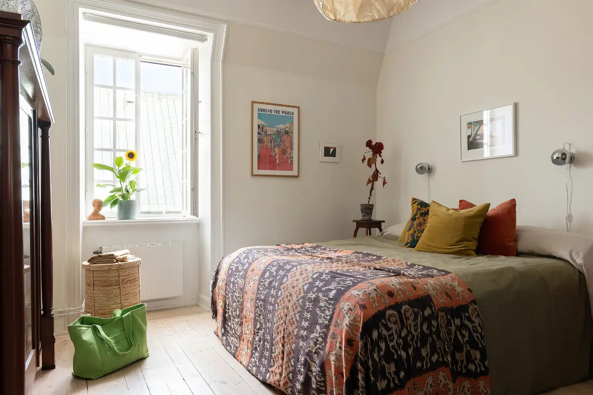 A Light Top-Floor Apartment with a Built-in Bookcase 16 floor-to-ceiling-bookcase-early-20th-century-apartment