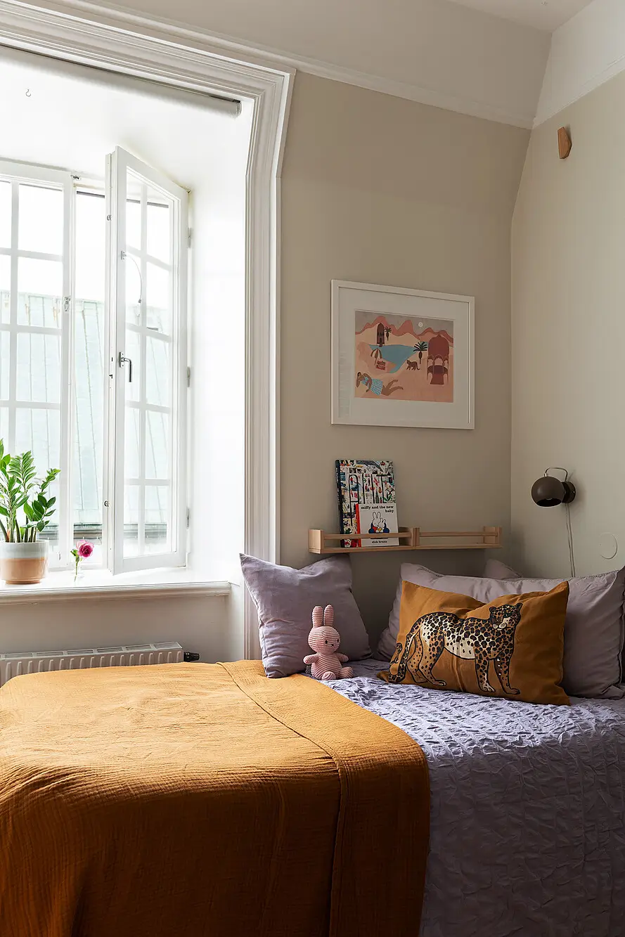 A Light Top-Floor Apartment with a Built-in Bookcase 21 floor-to-ceiling-bookcase-early-20th-century-apartment