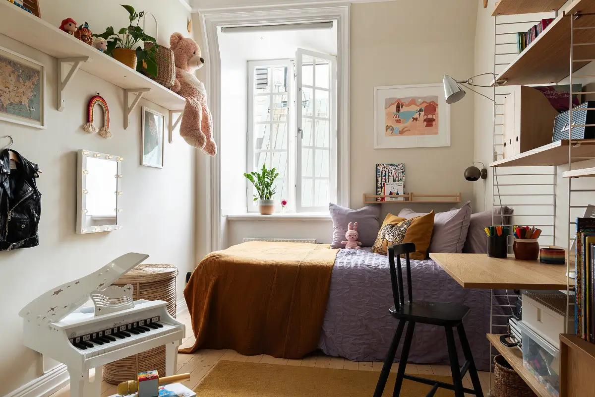 A Light Top-Floor Apartment with a Built-in Bookcase 22 floor-to-ceiling-bookcase-early-20th-century-apartment