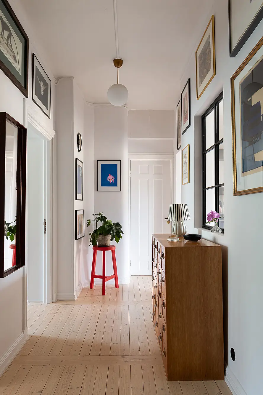 A Light Top-Floor Apartment with a Built-in Bookcase 23 floor-to-ceiling-bookcase-early-20th-century-apartment