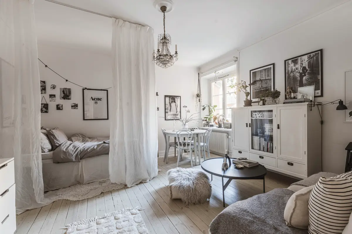 A Monochrome and Stylish Scandinavian Studio Apartment 1 monochrome-scandinavian-studio-apartment-curtain-room-divider-nordroom