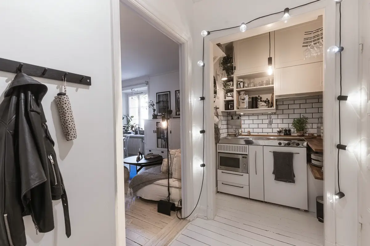 A Monochrome and Stylish Scandinavian Studio Apartment 15 monochrome-scandinavian-studio-apartment-curtain-room-divider-nordroom