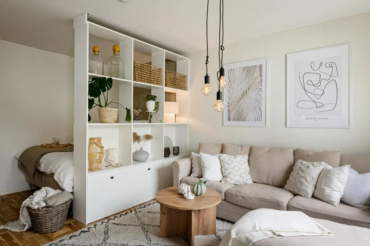 Studio Apartment Layout Ideas: Living Small is Looking Good 8 scandinavian-studio-apartment-bookcase-room-divider-nordroom
