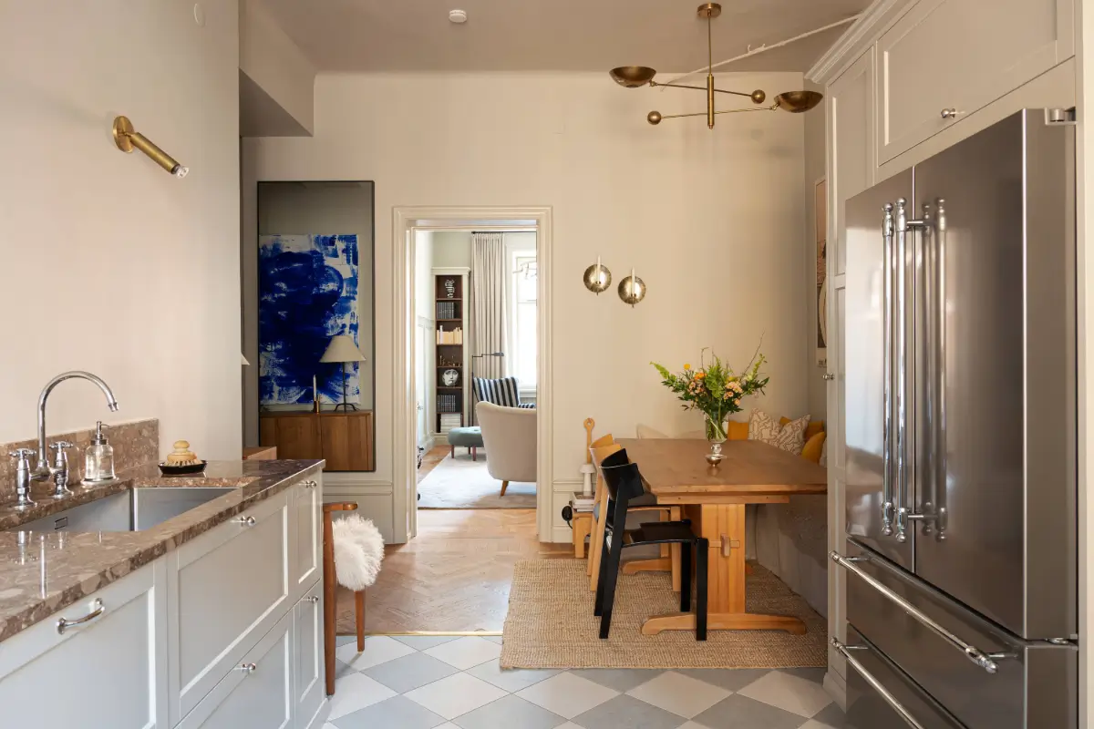A Spacious Kitchen and Dining Area in a Serene Stockholm Apartment 14 serene-renovated-apartment-large-kitchen-nordroom