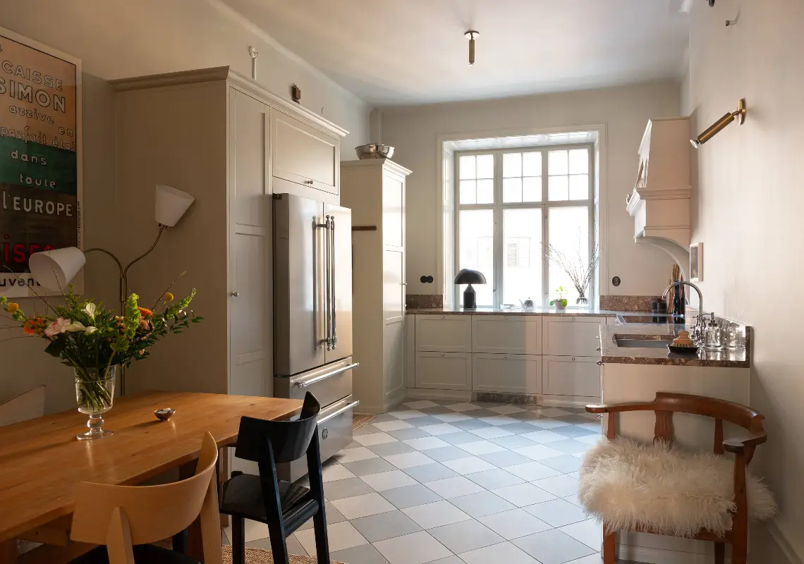 A Spacious Kitchen and Dining Area in a Serene Stockholm Apartment 15 serene-renovated-apartment-large-kitchen-nordroom