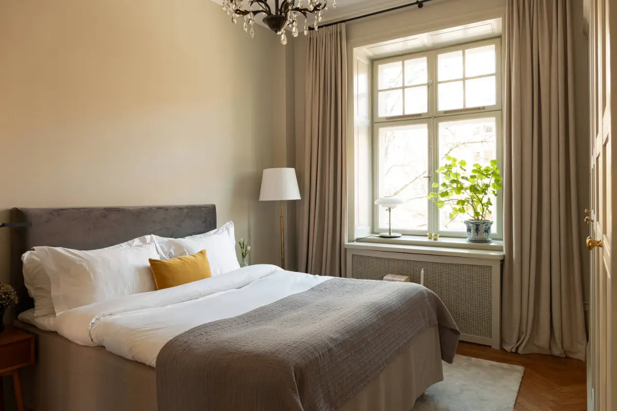 A Spacious Kitchen and Dining Area in a Serene Stockholm Apartment 9 serene-renovated-apartment-large-kitchen-nordroom