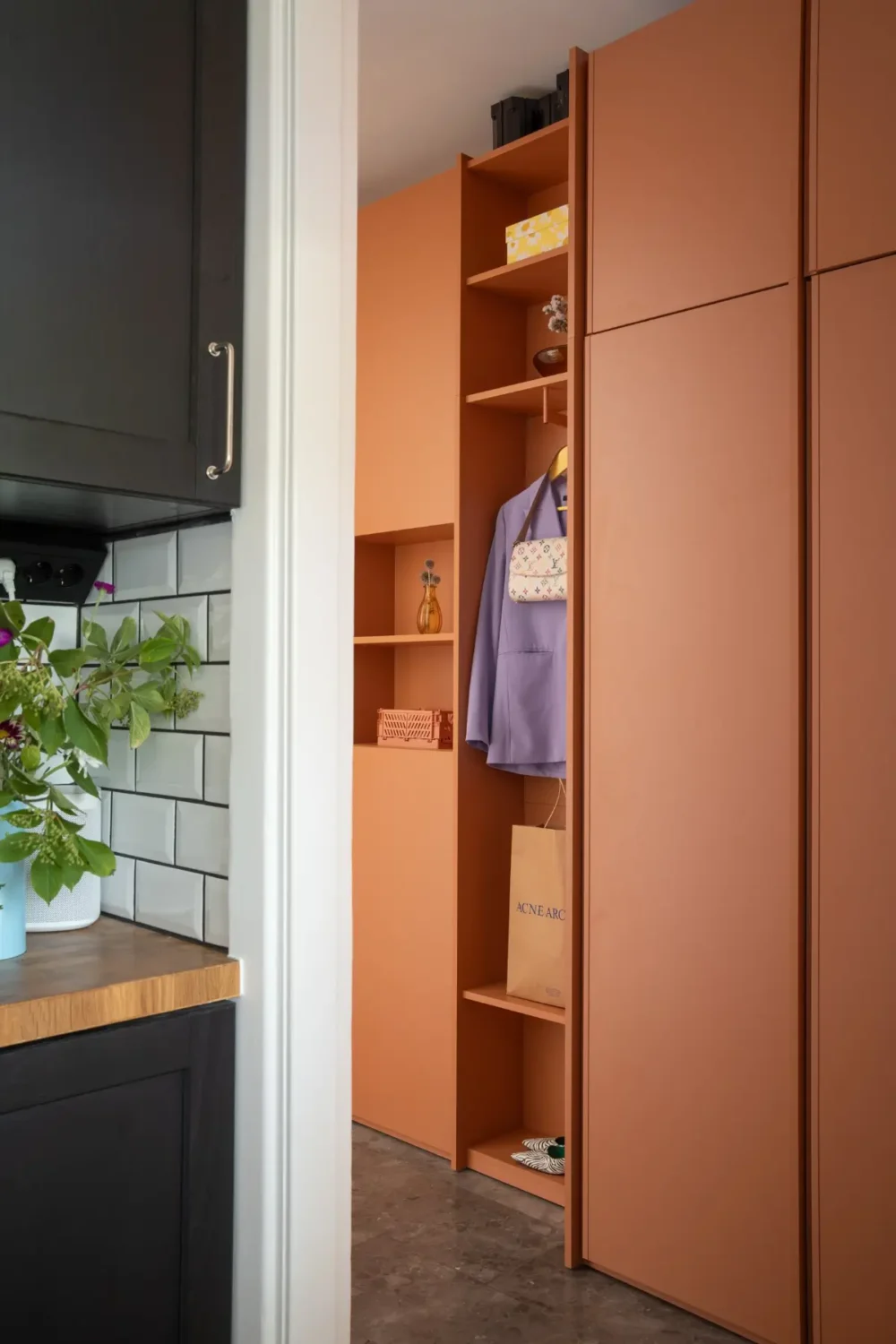 Cheerful Colors in a Small & Light 1940s Apartment in Stockholm 20 terracotta-colored-built-in-hall-furniture-nordroom