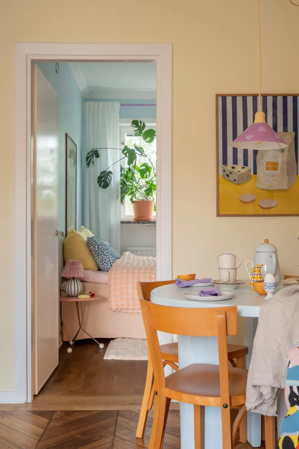 Cheerful Colors in a Small & Light 1940s Apartment in Stockholm 16 view into bedroom