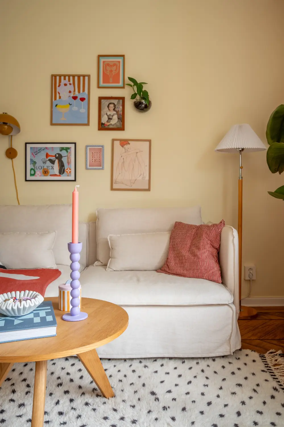 Cheerful Colors in a Small & Light 1940s Apartment in Stockholm 8 white living room sofa pastel color accents