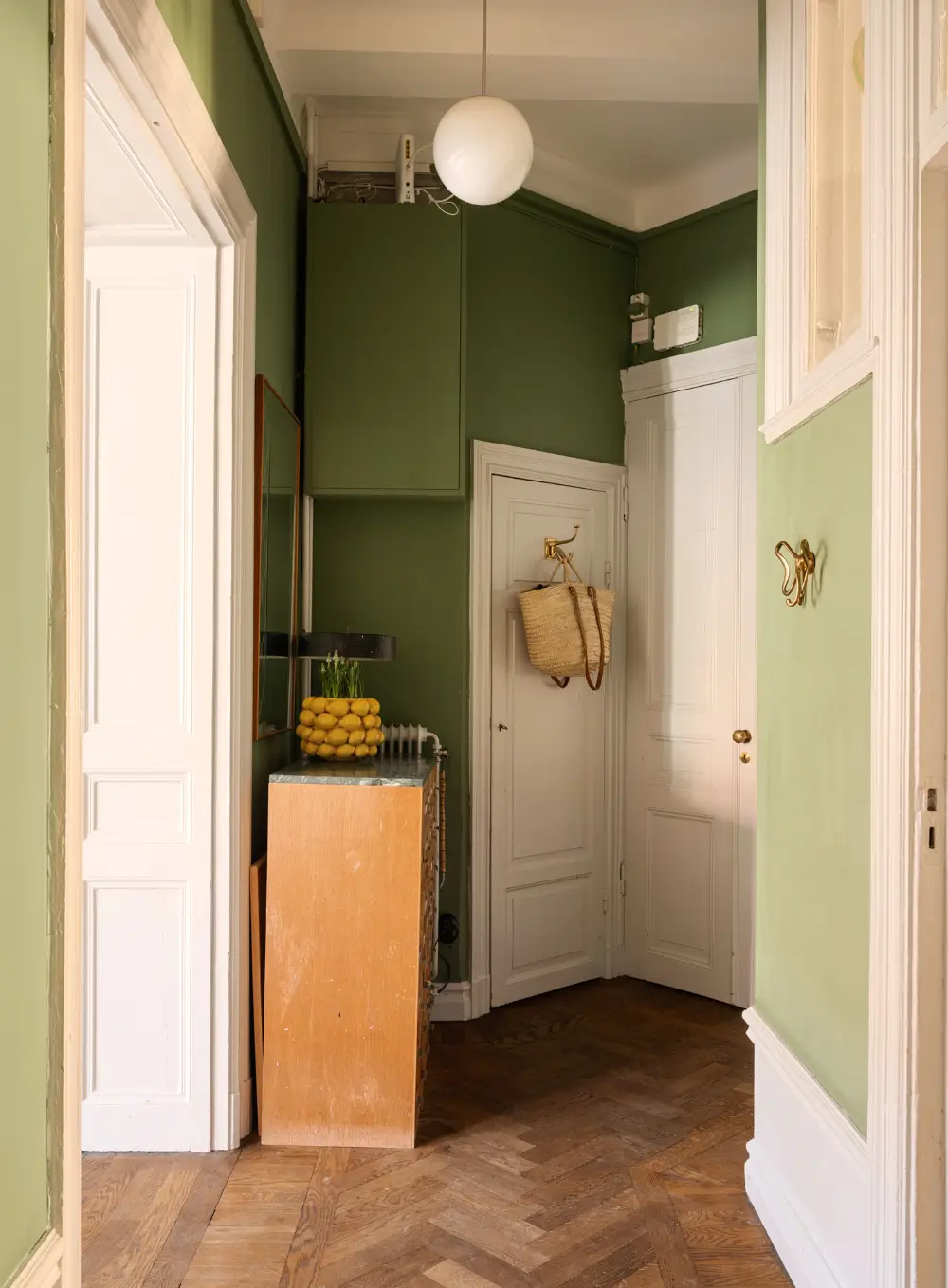 Josef Frank Designs in a Spacious Late 19th-Century Apartment 26 botanical-wallpaper-stockholm-apartment-nordroom