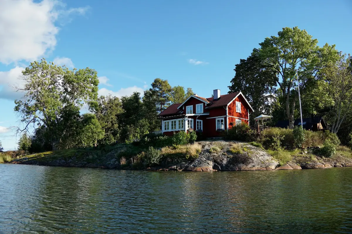 A Cozy Wooden Guest House with a Brick Floor at a Swedish Country Estate 47 cozy-guesthouse-stone-floor-wallpaper-swedish-island-home-nordroom