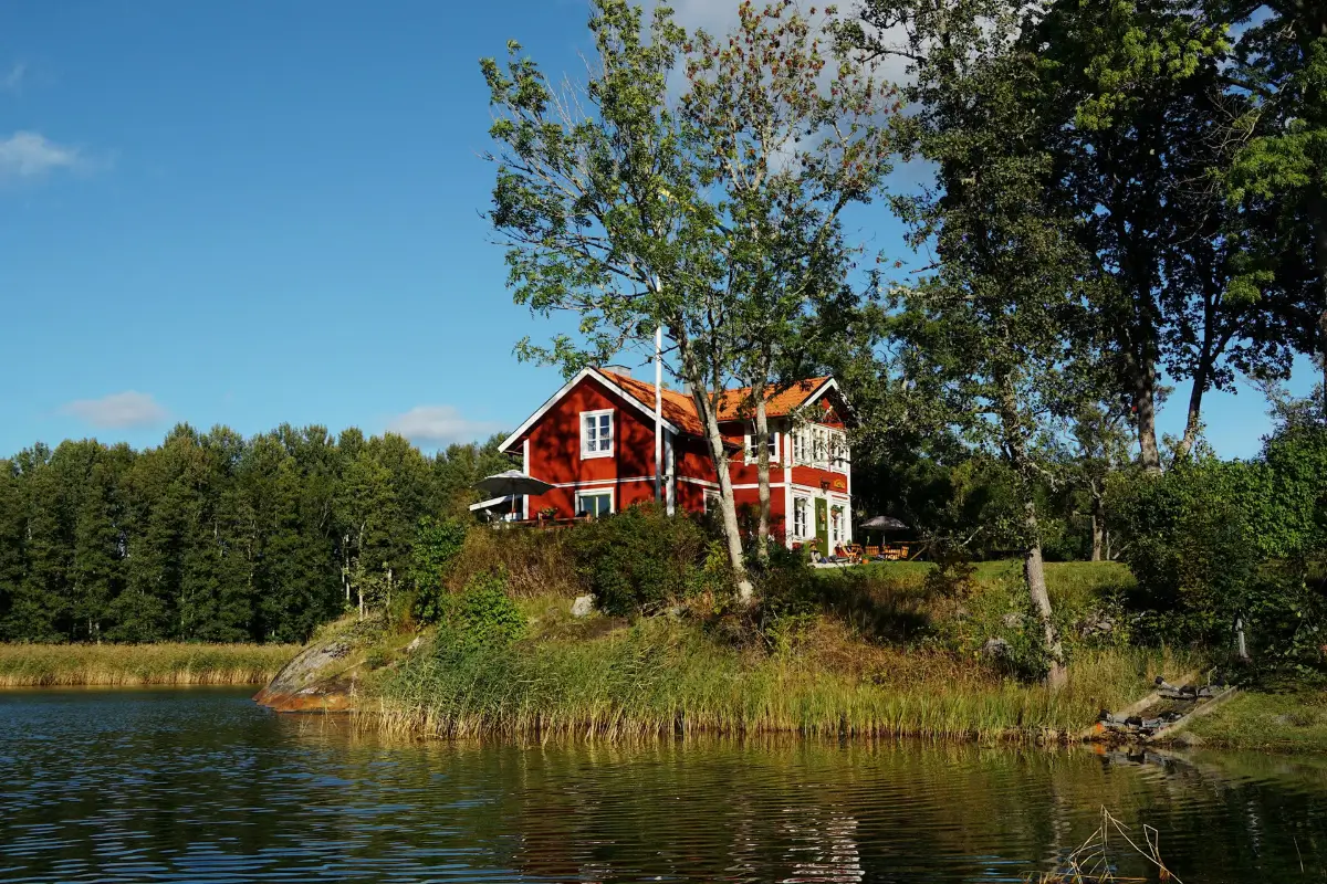 A Cozy Wooden Guest House with a Brick Floor at a Swedish Country Estate 46 cozy-guesthouse-stone-floor-wallpaper-swedish-island-home-nordroom