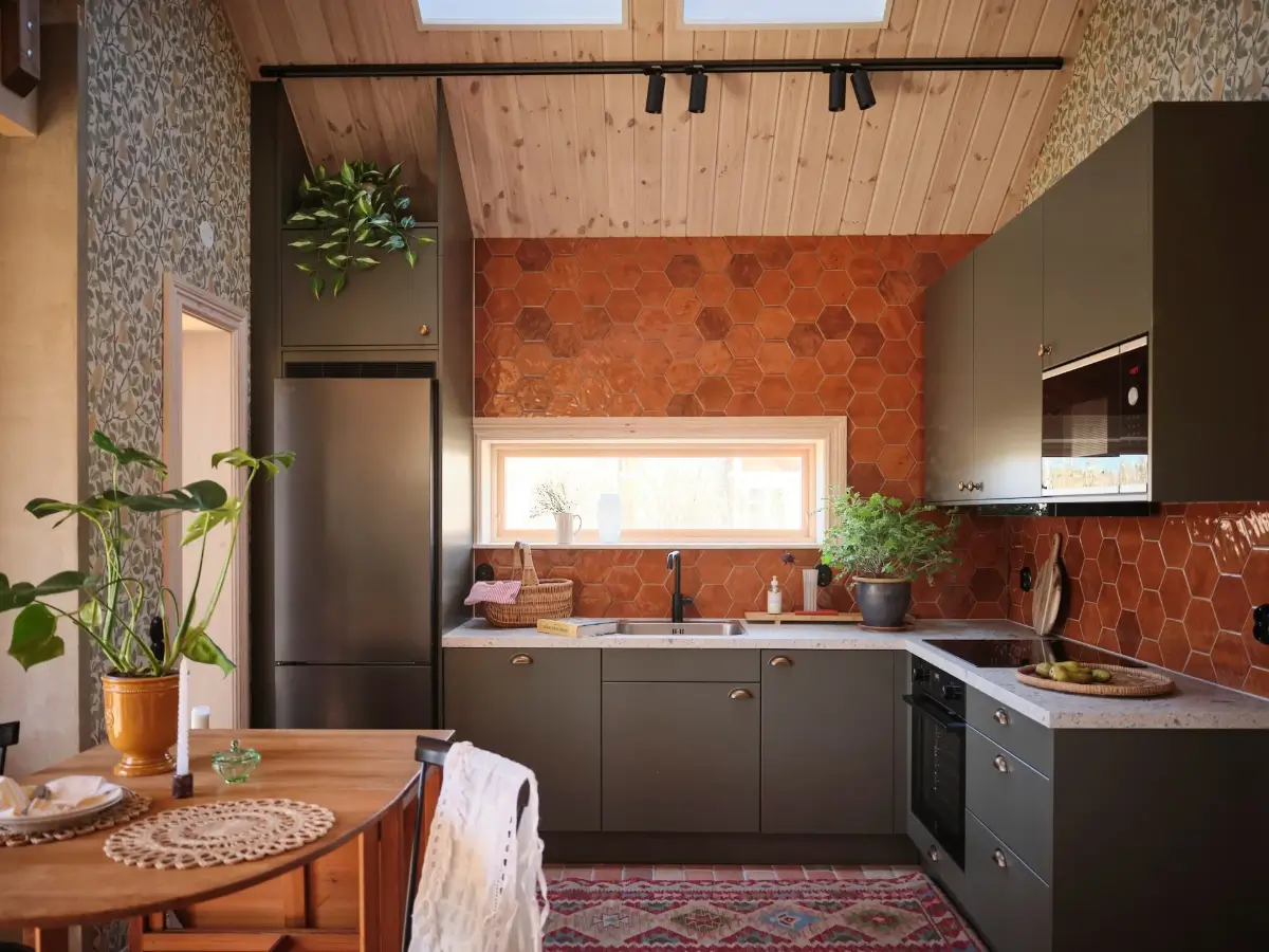 A Cozy Wooden Guest House with a Brick Floor at a Swedish Country Estate 4 cozy-guesthouse-stone-floor-wallpaper-swedish-island-home-nordroom