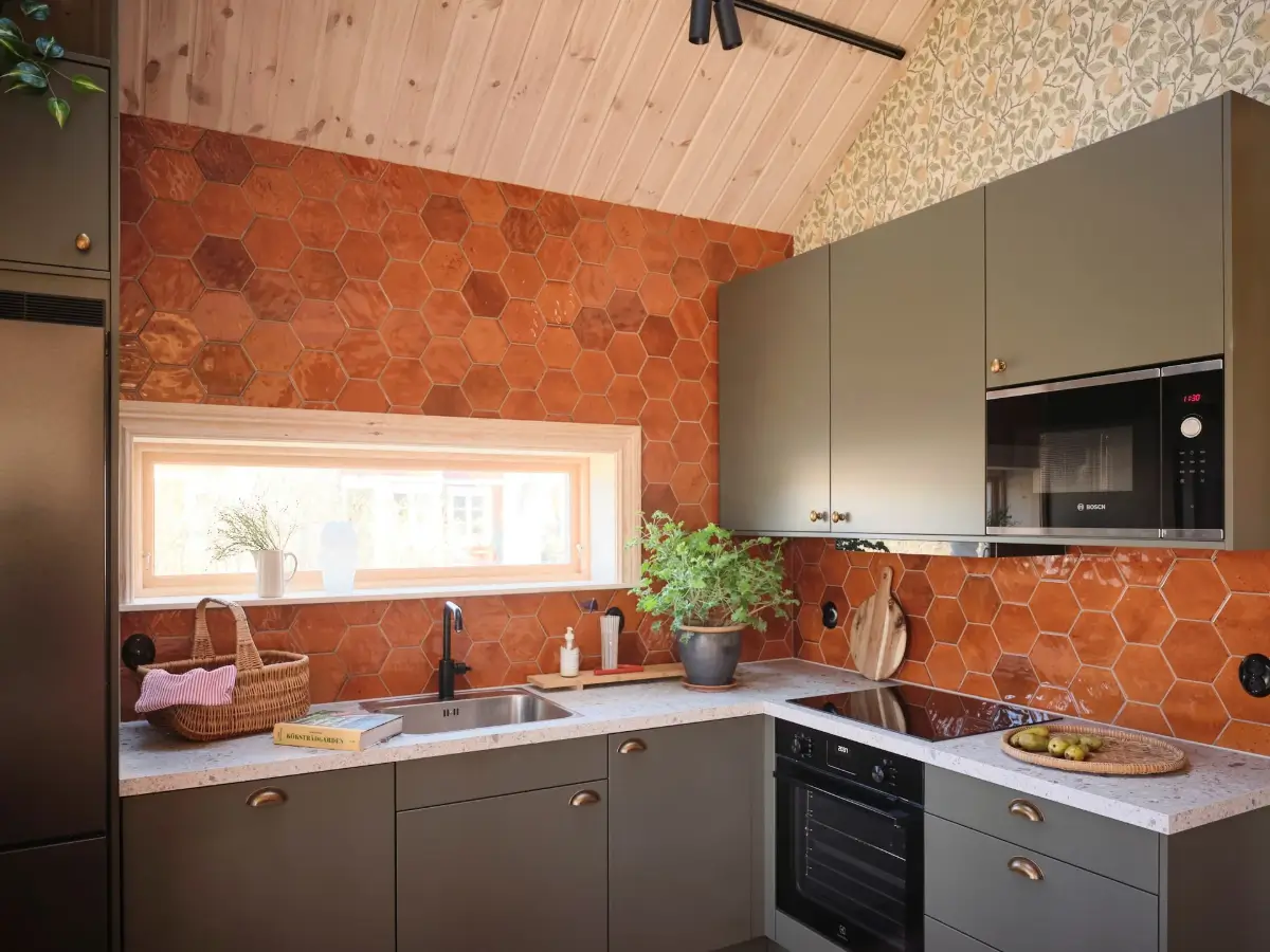 A Cozy Wooden Guest House with a Brick Floor at a Swedish Country Estate 5 cozy-guesthouse-stone-floor-wallpaper-swedish-island-home-nordroom