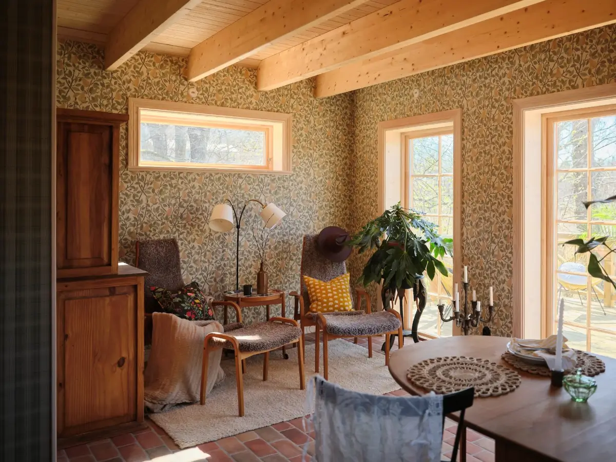 A Cozy Wooden Guest House with a Brick Floor at a Swedish Country Estate 7 cozy-guesthouse-stone-floor-wallpaper-swedish-island-home-nordroom
