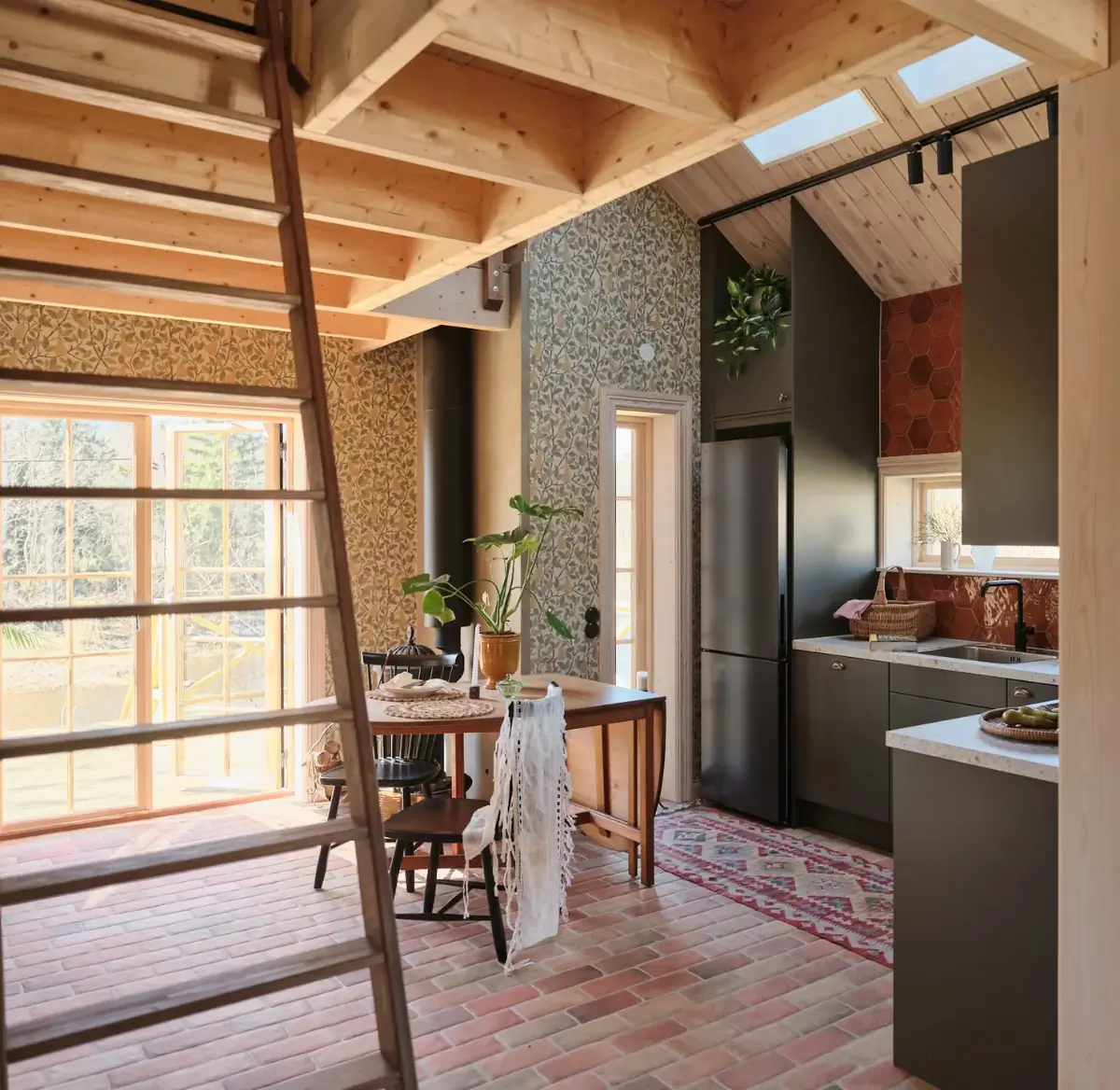 A Cozy Wooden Guest House with a Brick Floor at a Swedish Country Estate 9 cozy-guesthouse-stone-floor-wallpaper-swedish-island-home-nordroom