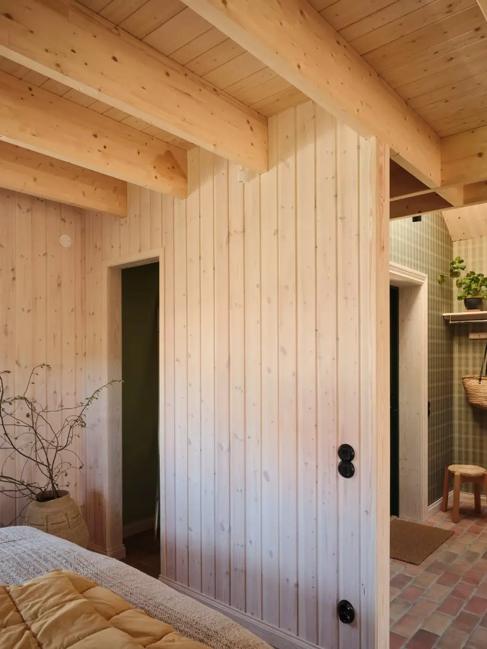 A Cozy Wooden Guest House with a Brick Floor at a Swedish Country Estate 12 cozy-guesthouse-stone-floor-wallpaper-swedish-island-home-nordroom