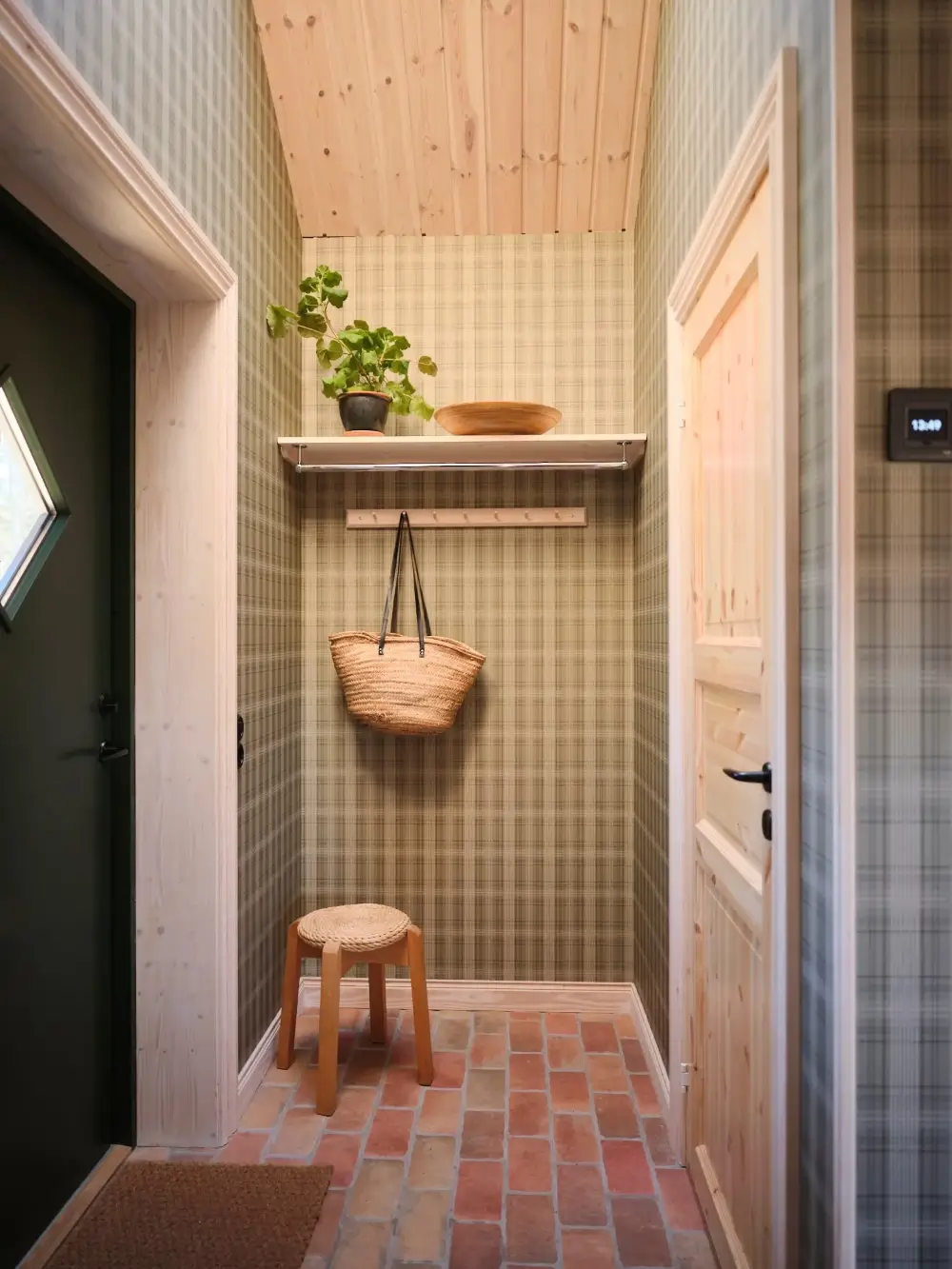 A Cozy Wooden Guest House with a Brick Floor at a Swedish Country Estate 15 cozy-guesthouse-stone-floor-wallpaper-swedish-island-home-nordroom