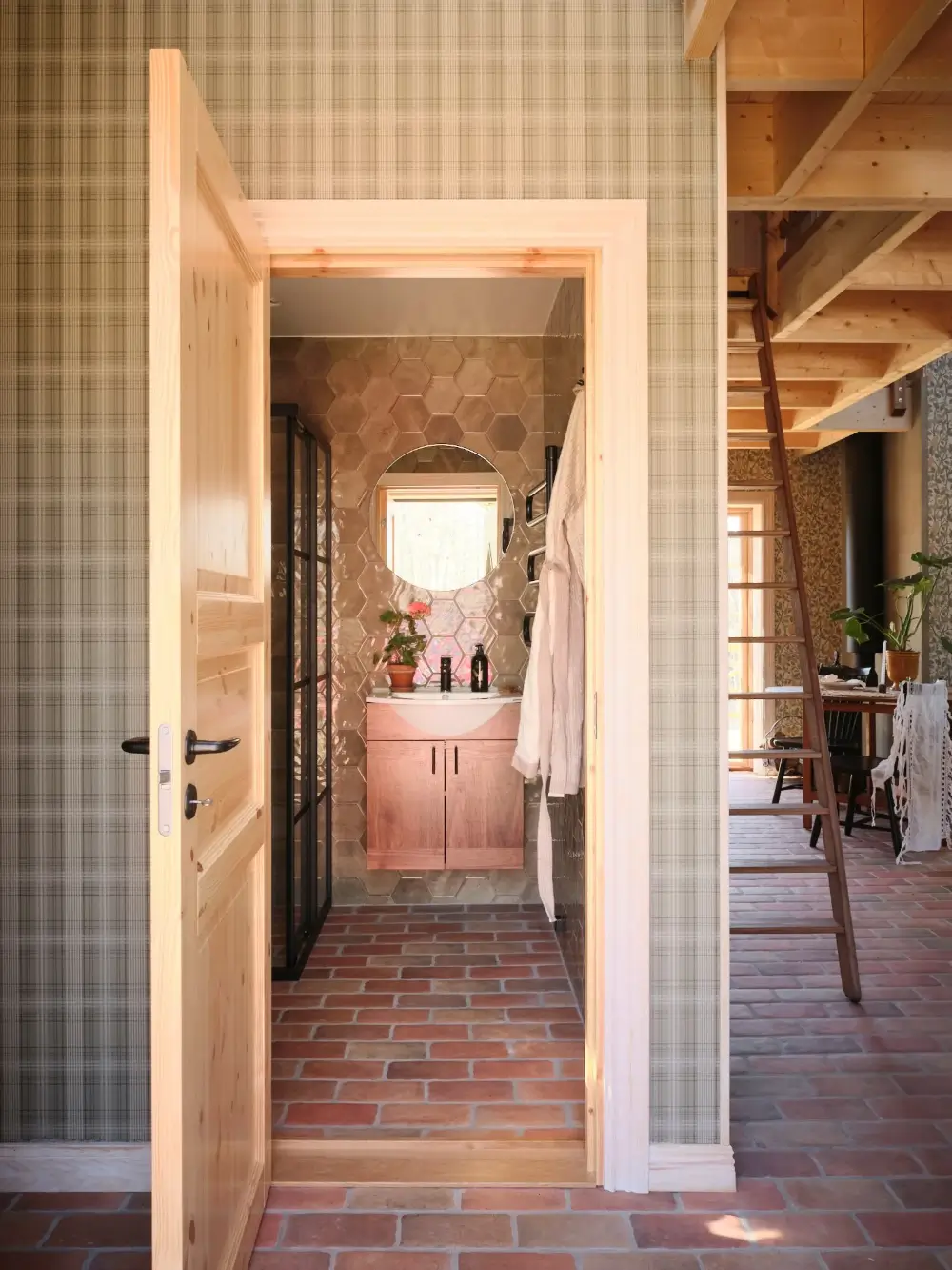 A Cozy Wooden Guest House with a Brick Floor at a Swedish Country Estate 17 cozy-guesthouse-stone-floor-wallpaper-swedish-island-home-nordroom