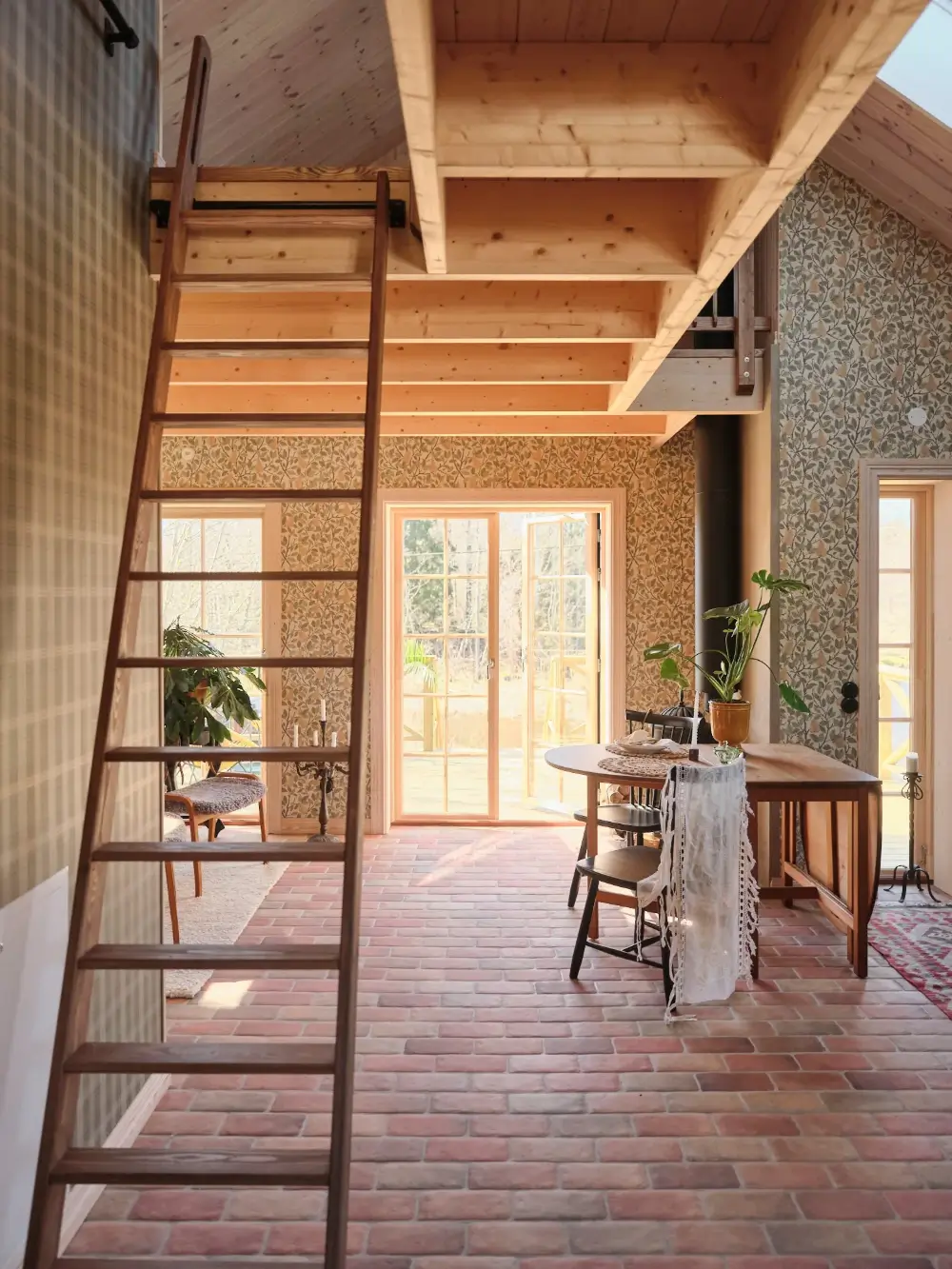 A Cozy Wooden Guest House with a Brick Floor at a Swedish Country Estate 20 cozy-guesthouse-stone-floor-wallpaper-swedish-island-home-nordroom