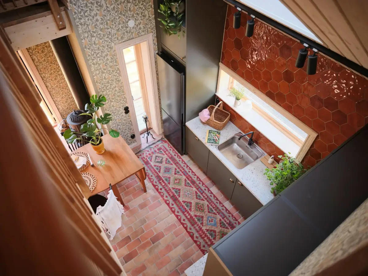 A Cozy Wooden Guest House with a Brick Floor at a Swedish Country Estate 21 cozy-guesthouse-stone-floor-wallpaper-swedish-island-home-nordroom