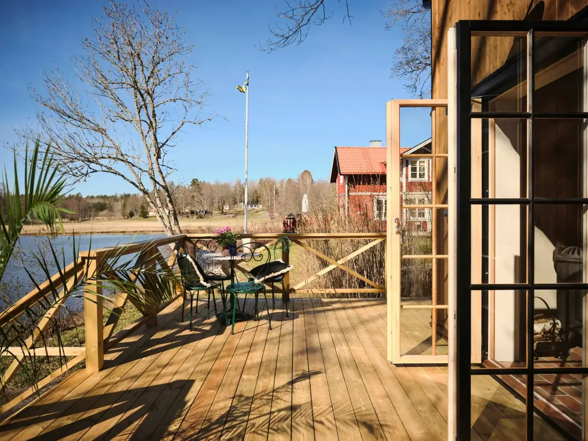 A Cozy Wooden Guest House with a Brick Floor at a Swedish Country Estate 29 cozy-guesthouse-stone-floor-wallpaper-swedish-island-home-nordroom