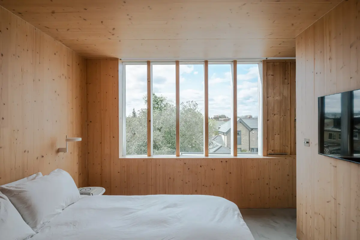 Spruce, Polished Concrete, and Terrazzo in an Architect-Designed London Home 19 modern-london-house-spruce-interiors-lush-garden