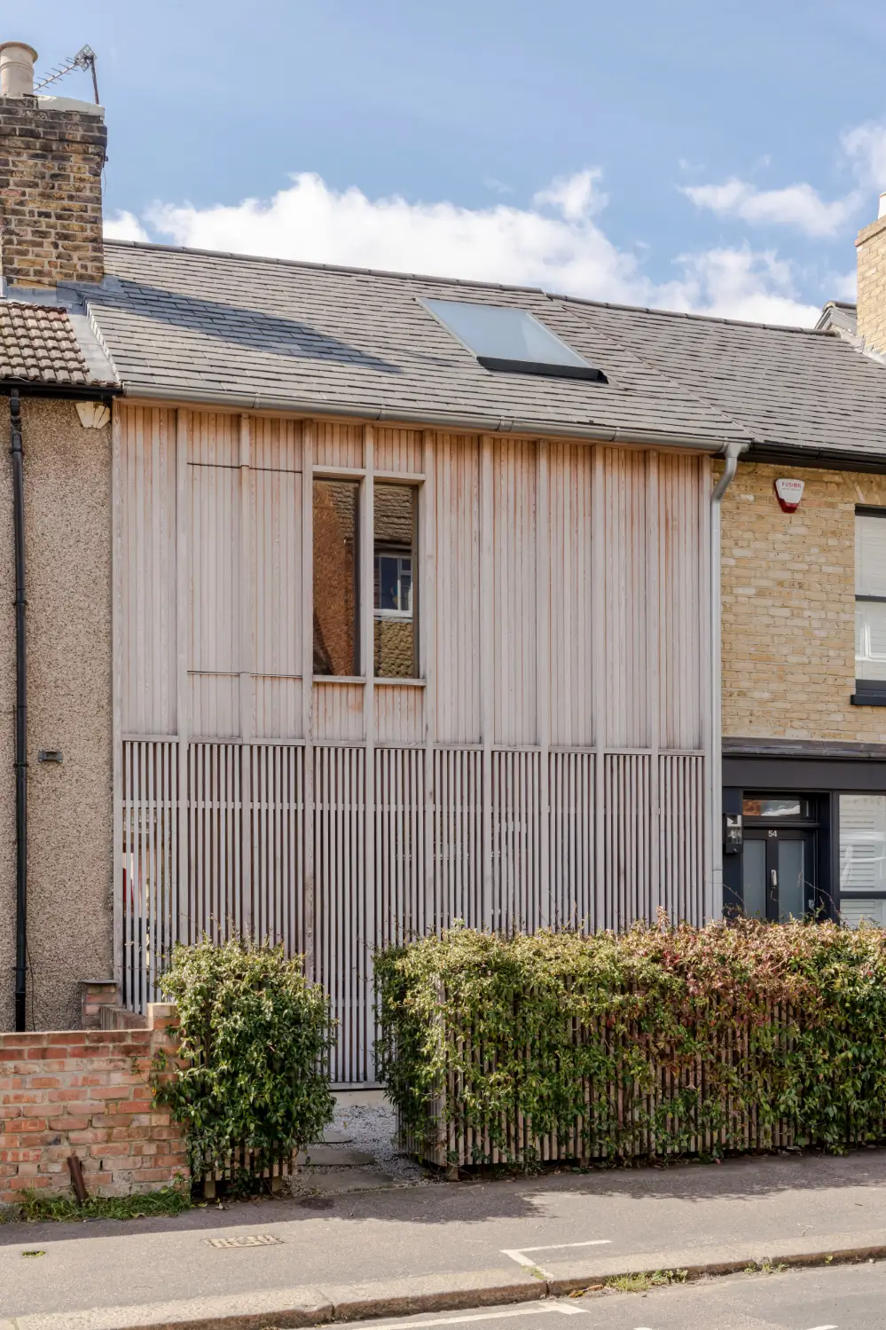 Spruce, Polished Concrete, and Terrazzo in an Architect-Designed London Home 1 modern-london-house-spruce-interiors-lush-garden