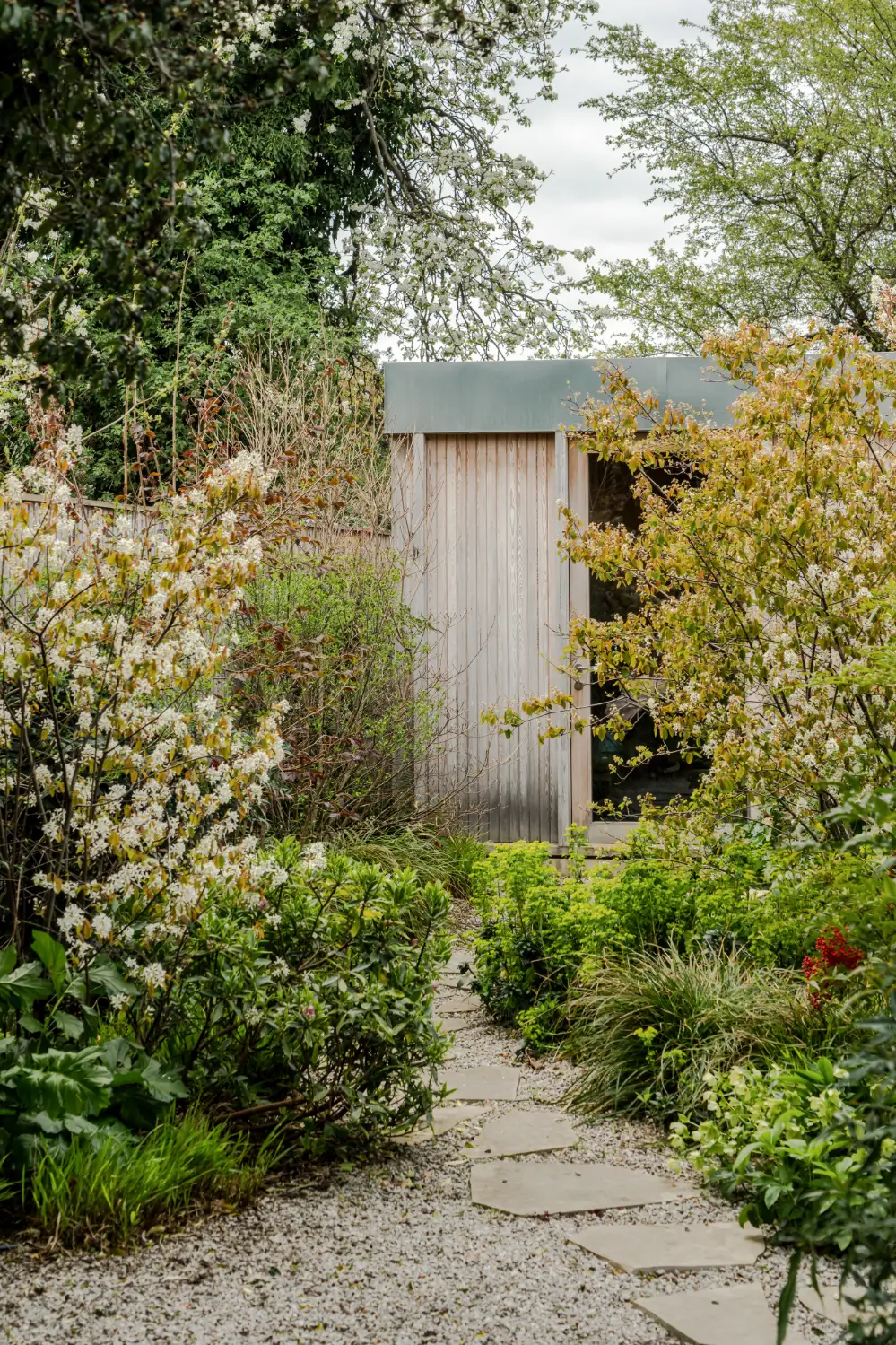Spruce, Polished Concrete, and Terrazzo in an Architect-Designed London Home 26 modern-london-house-spruce-interiors-lush-garden