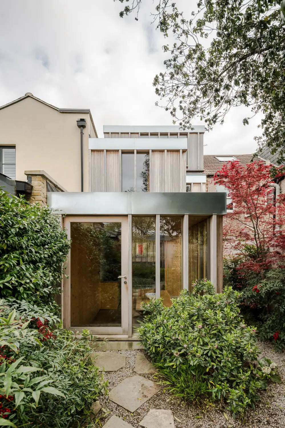 Spruce, Polished Concrete, and Terrazzo in an Architect-Designed London Home 23 modern-london-house-spruce-interiors-lush-garden