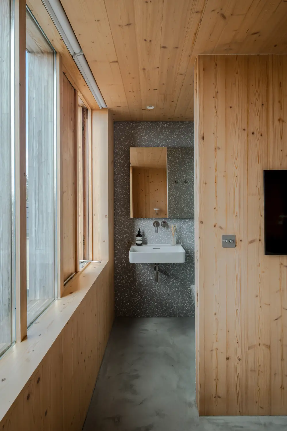 Spruce, Polished Concrete, and Terrazzo in an Architect-Designed London Home 21 modern-london-house-spruce-interiors-lush-garden