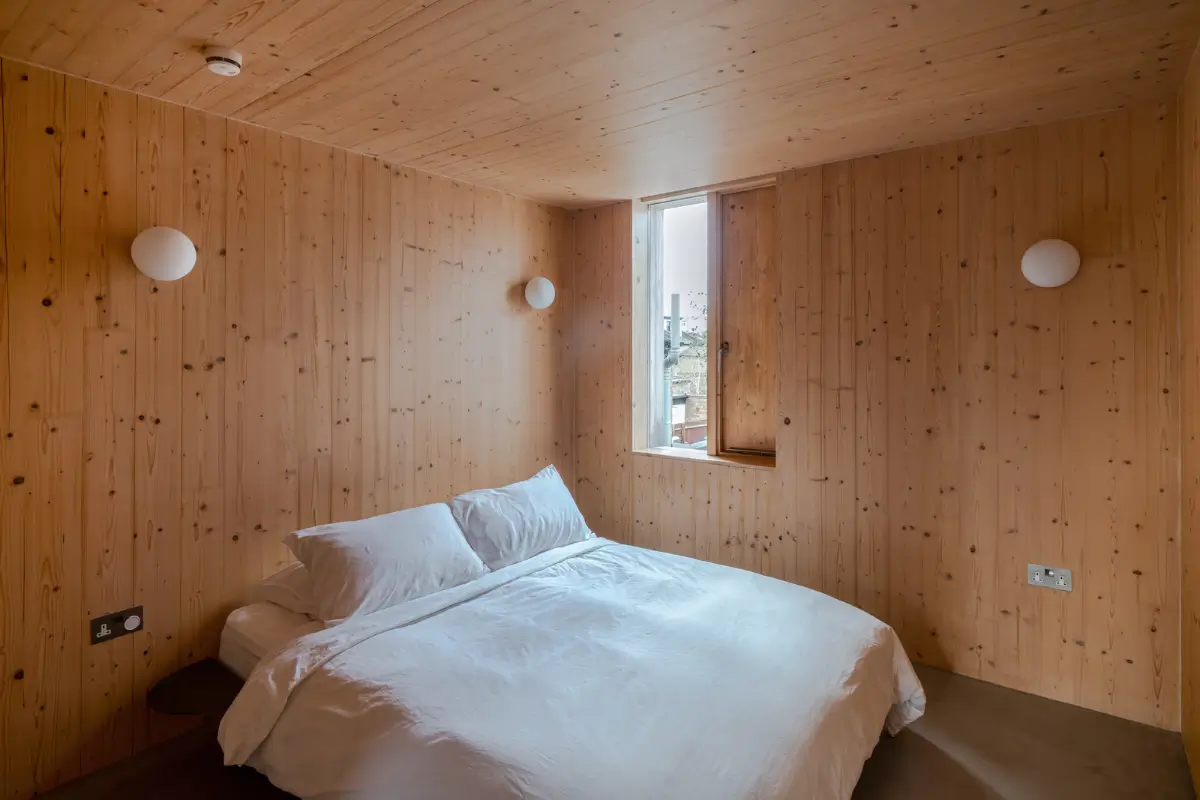 Spruce, Polished Concrete, and Terrazzo in an Architect-Designed London Home 13 modern-london-house-spruce-interiors-lush-garden