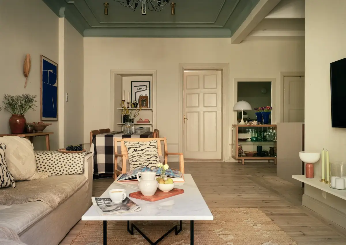 A Serene Color Palette and an Open-Plan Living Space in a Stockholm Apartment 9 open-plan-living-space-painted-ceiling-turn-of-the-century-stockholm-apartment-nordroom