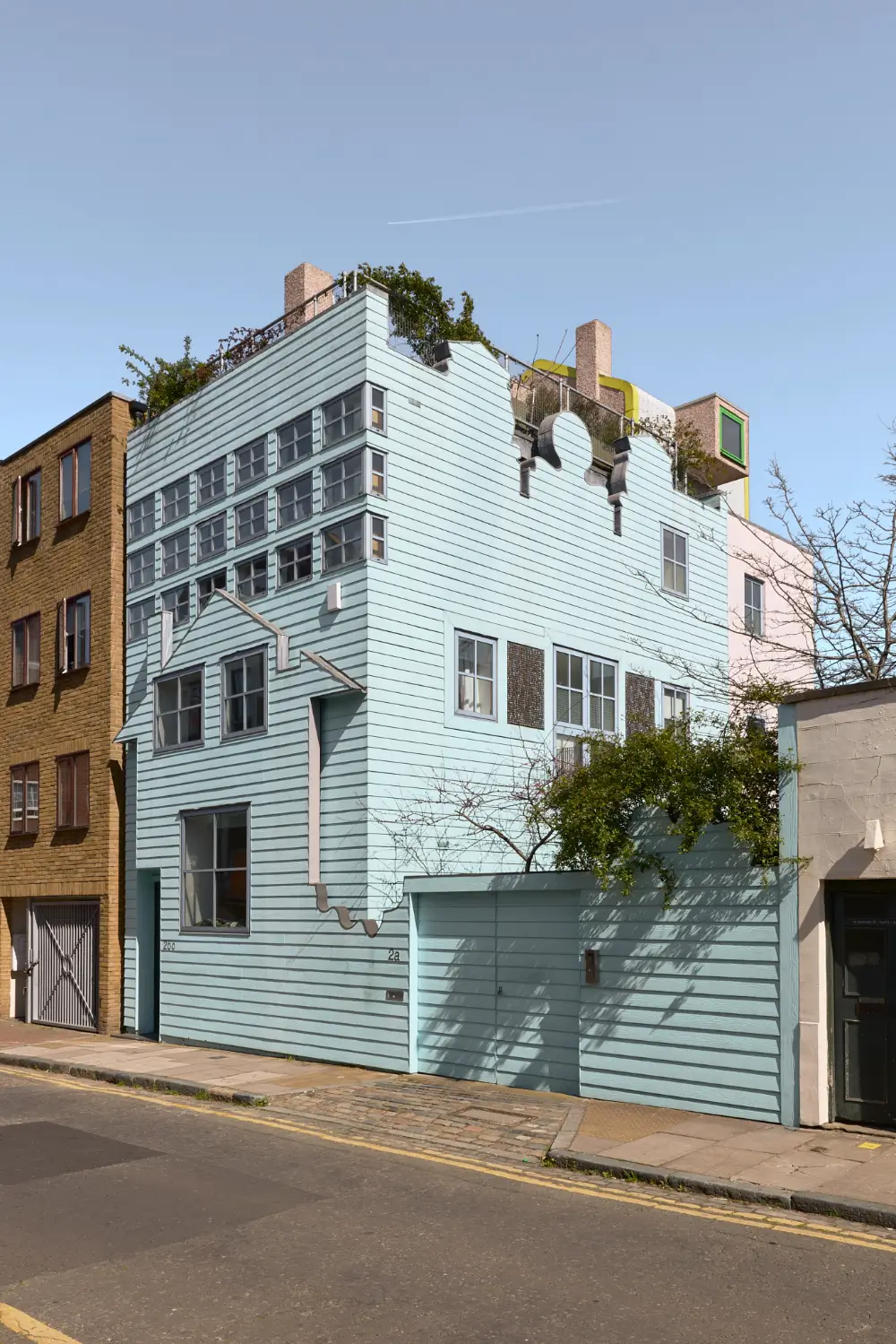 An Abundance of Color in a Unique and Playful London House 1 playful-colorful-architect-designed-blue-house-london