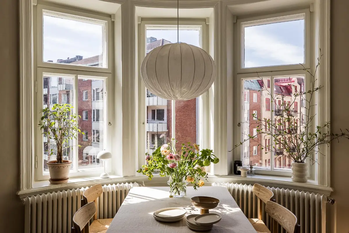 A Green Kitchen, Period Elements, and Jotun Colors in a Small Corner Apartment 3 renovated-late-19th-century-corner-apartment-gothenburg-nordroom