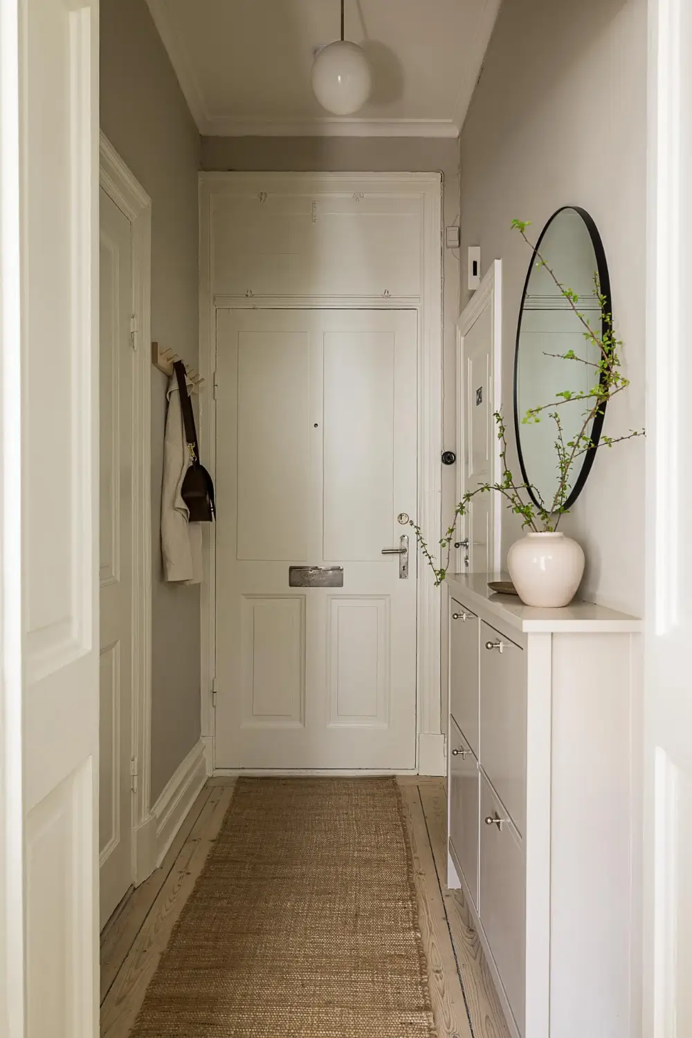 A Green Kitchen, Period Elements, and Jotun Colors in a Small Corner Apartment 25 renovated-late-19th-century-corner-apartment-gothenburg-nordroom